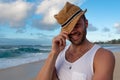 Young caucasian male standing on Sunset Beach in Hawaii with the ocean in the background Royalty Free Stock Photo