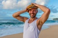 Young caucasian male standing on Sunset Beach in Hawaii with the ocean in the background Royalty Free Stock Photo