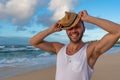 Young caucasian male standing on Sunset Beach in Hawaii with the ocean in the background Royalty Free Stock Photo