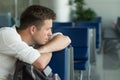 Young caucasian man at the airport waiting for his plane Royalty Free Stock Photo