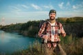 Young caucasian man with backpack resting and Royalty Free Stock Photo