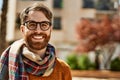 Young caucasian man with beard wearing glasses outdoors on a sunny day Royalty Free Stock Photo