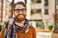 Young caucasian man with beard wearing glasses outdoors on a sunny day Royalty Free Stock Photo