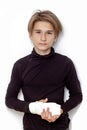Young caucasian man with a broken arm wearing an arm splint isolated on white background Royalty Free Stock Photo