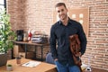 Young caucasian man business worker smiling confident holding briefcase at office Royalty Free Stock Photo