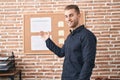 Young caucasian man business worker smiling confident speaking at office Royalty Free Stock Photo