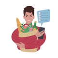 young caucasian man with groceries bag and a shopping list on a smartphone. Royalty Free Stock Photo