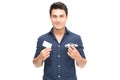 Young Caucasian man holding car insurance card Royalty Free Stock Photo