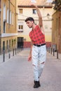 Young caucasian man with long false nails dancing at street, contemporary dance.