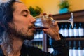 Man enjoy the taste of glass of red wine Royalty Free Stock Photo