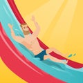 Young caucasian man riding down a waterslide. Royalty Free Stock Photo