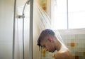 Young caucasian man showering in bathroom Royalty Free Stock Photo