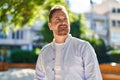 Young caucasian man smiling confident looking to the sky at park Royalty Free Stock Photo