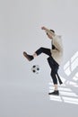 Guy Kicking Soccer Ball