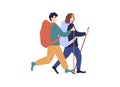 Young caucasian man and woman with backpacks and walking sticks are travelling together Royalty Free Stock Photo