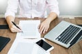 Young caucasian man working at home planning work writing note o Royalty Free Stock Photo