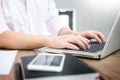 Young caucasian man working at home planning work writing note o Royalty Free Stock Photo