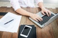 Young caucasian man working at home planning work writing note o Royalty Free Stock Photo