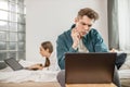 Married couple looking for a bargain online Royalty Free Stock Photo