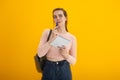 young caucasian student freelancer woman holding pen and notepad in hands Royalty Free Stock Photo
