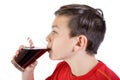 Young caucasian teenage boy drinking cola Royalty Free Stock Photo