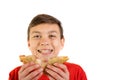 Young caucasian teenage boy with a sandwich Royalty Free Stock Photo