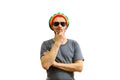 Young caucasian think man in rasta hat, sunglasses and grey t-shirt on white background Royalty Free Stock Photo