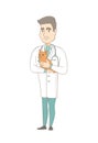 Young caucasian veterinarian with cat in hands.