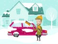 Young caucasian white man cleaning car from snow. Royalty Free Stock Photo