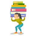 College student carrying a heavy pile of books. Royalty Free Stock Photo