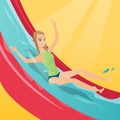 Young caucasian woman riding down a waterslide.