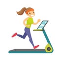 Young caucasian white woman running on treadmill. Royalty Free Stock Photo