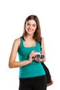 Young caucasian woman with camera isolated over