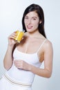 Young caucasian woman drinking orange juice Royalty Free Stock Photo