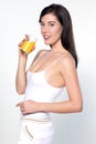 Young caucasian woman drinking orange juice