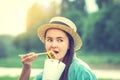 young caucasian woman eating thai food at sunset Royalty Free Stock Photo