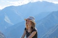 Young free woman travel alone in Andes mountains in Peru. Landscape with solo female tourist, mountains and copy space Royalty Free Stock Photo