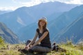 Young free woman travel alone in Andes mountains in Peru. Landscape with solo female tourist, mountains and copy space Royalty Free Stock Photo