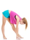 Young caucasian woman is exercising, bending down. Royalty Free Stock Photo