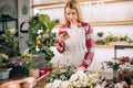 Young woman florist at work