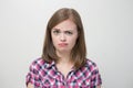 Young caucasian woman girl with questioning, puzzled, confused expression, thinking or remembering something Royalty Free Stock Photo