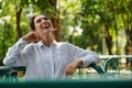 Young caucasian woman having fun relaxing in greenery natural park Royalty Free Stock Photo