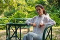 Young caucasian woman having fun relaxing in greenery natural park Royalty Free Stock Photo