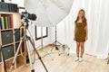 Young caucasian woman model having photo shooting photo studio