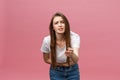 Young caucasian woman over isolated background with hand on stomach because indigestion, painful illness feeling unwell Royalty Free Stock Photo