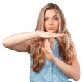 Young caucasian woman over isolated background making time out gesture Royalty Free Stock Photo