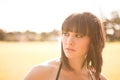 Young caucasian woman in a park with soft light