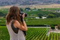 Photographer taking vineyards pictures Royalty Free Stock Photo