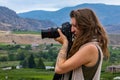 Photographer taking vineyards pictures Royalty Free Stock Photo