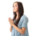 Young caucasian woman praying Royalty Free Stock Photo